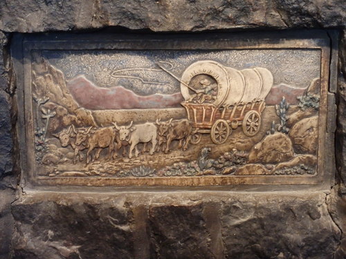 GDMBR: A placard above the stone fireplace.
